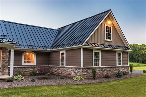 brown metal roof grey house|black house brown roof.